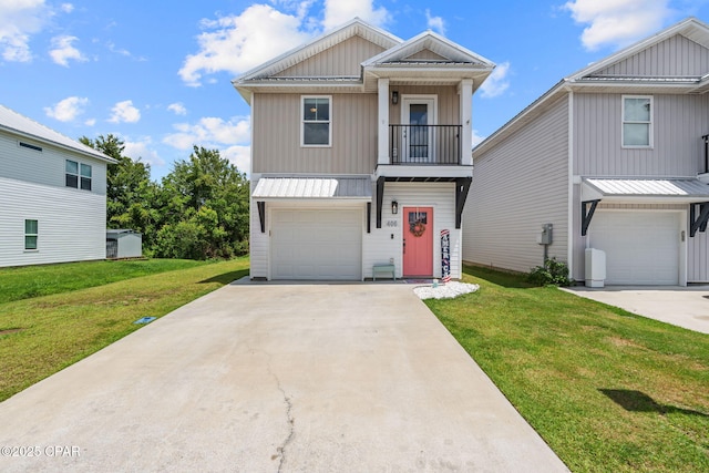 406 Raven Ln, Panama City, FL 32404 - view of front of home featuring a garage, a front lawn, and a metal roof