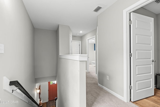 406 Raven Ln, Panama City, FL 32404 - hall featuring an upstairs landing, recessed lighting, and carpet floors