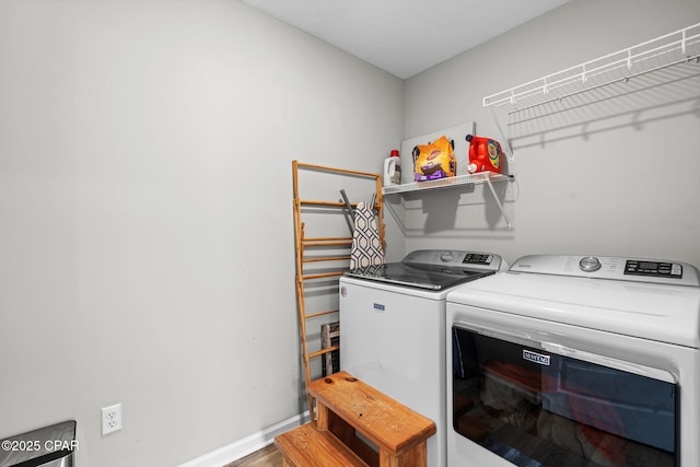 406 Raven Ln, Panama City, FL 32404 - laundry area featuring independent washer and dryer and wood finished floors