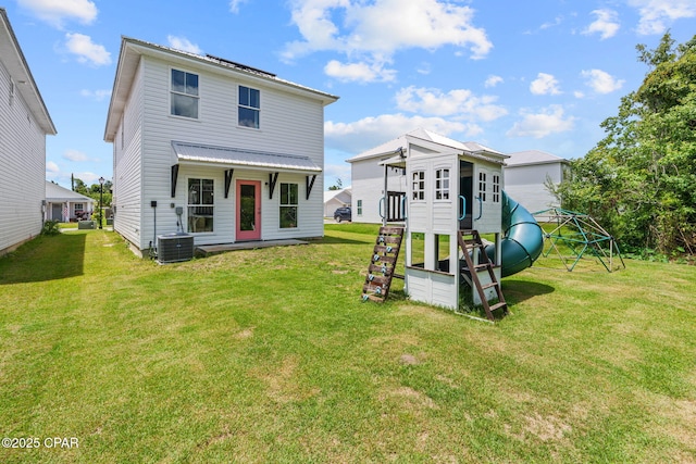 406 Raven Ln, Panama City, FL 32404 - back of house featuring a playground and a lawn