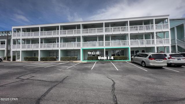 17670 Front Beach Rd Unit I4, Panama City Beach, FL 32413 - view of apartment building / complex with uncovered parking