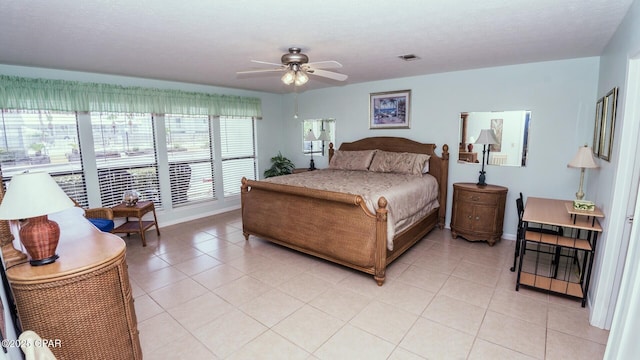 17670 Front Beach Rd Unit I4, Panama City Beach, FL 32413 - bedroom with light tile patterned floors and a ceiling fan