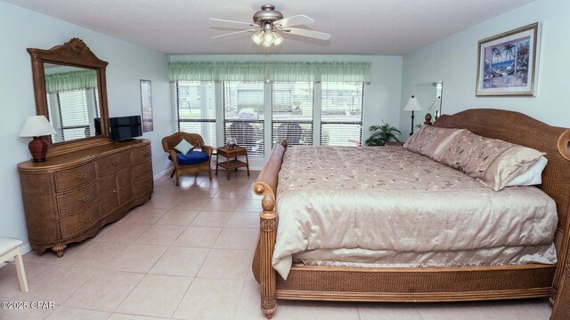 17670 Front Beach Rd Unit I4, Panama City Beach, FL 32413 - bedroom featuring light tile patterned floors and a ceiling fan