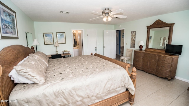 17670 Front Beach Rd Unit I4, Panama City Beach, FL 32413 - bedroom with light tile patterned floors, ceiling fan, and ensuite bathroom