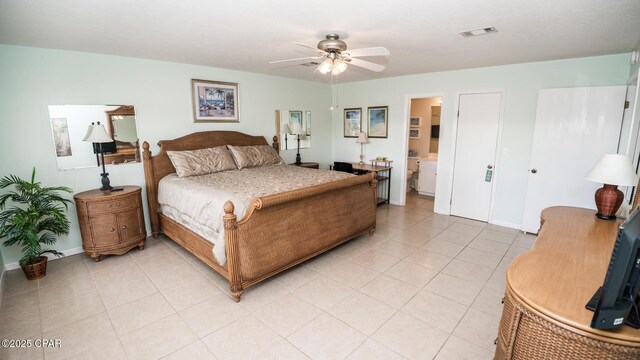 17670 Front Beach Rd Unit I4, Panama City Beach, FL 32413 - bedroom featuring light tile patterned floors, a ceiling fan, and ensuite bath