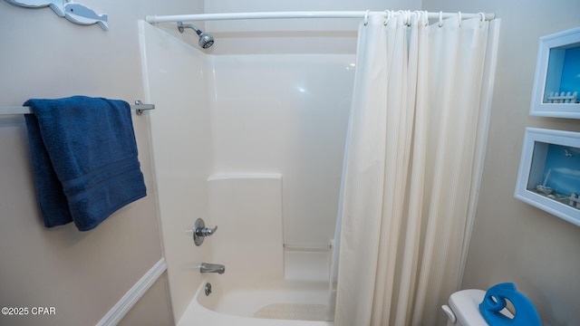 17670 Front Beach Rd Unit I4, Panama City Beach, FL 32413 - bathroom featuring shower / tub combo and toilet
