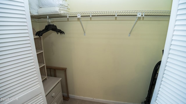17670 Front Beach Rd Unit I4, Panama City Beach, FL 32413 - spacious closet with light tile patterned floors