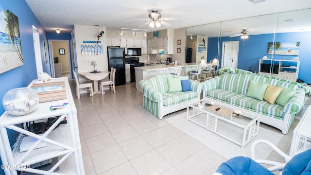 17670 Front Beach Rd Unit I4, Panama City Beach, FL 32413 - living area with ceiling fan, track lighting, and light tile patterned floors