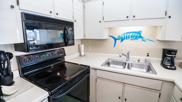 17670 Front Beach Rd Unit I4, Panama City Beach, FL 32413 - kitchen featuring black appliances, white cabinetry, and light countertops