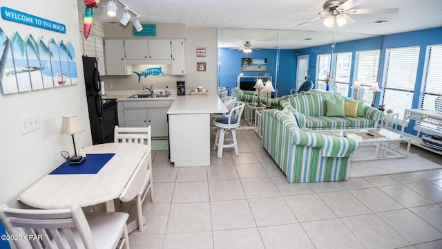 17670 Front Beach Rd Unit I4, Panama City Beach, FL 32413 - living room with a ceiling fan and light tile patterned flooring