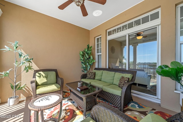 4100 Marriott Dr Unit 402, Panama City Beach, FL 32408 - sunroom featuring ceiling fan and outdoor lounge area