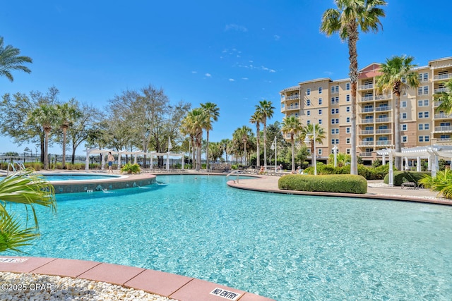 4100 Marriott Dr Unit 402, Panama City Beach, FL 32408 - community pool with a pergola