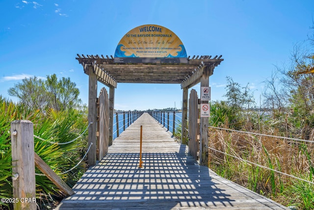 4100 Marriott Dr Unit 402, Panama City Beach, FL 32408 - dock featuring a pergola
