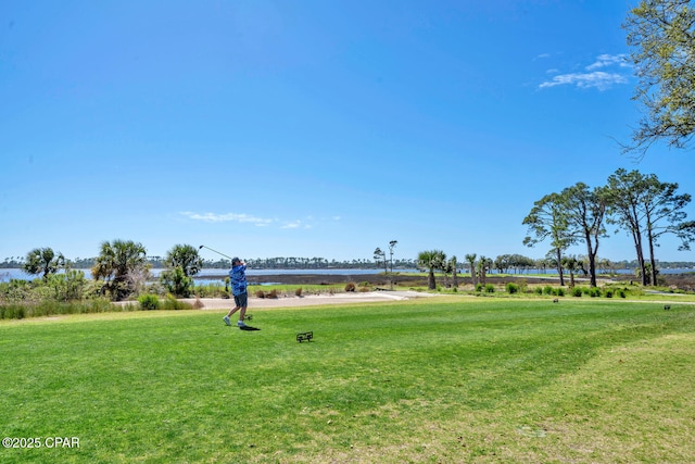4100 Marriott Dr Unit 402, Panama City Beach, FL 32408 - surrounding community featuring a yard and a water view