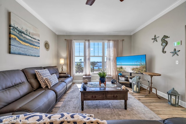 4100 Marriott Dr Unit 402, Panama City Beach, FL 32408 - living room featuring hardwood / wood-style flooring, ceiling fan, and ornamental molding