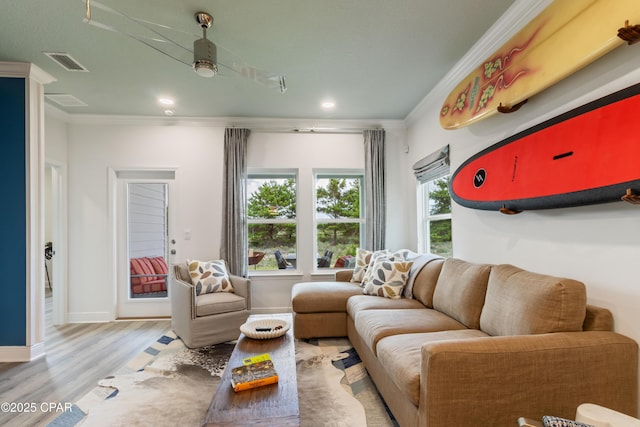 21818 Kelly Pines Pl, Panama City Beach, FL 32413 - living room with ornamental molding, wood finished floors, and recessed lighting