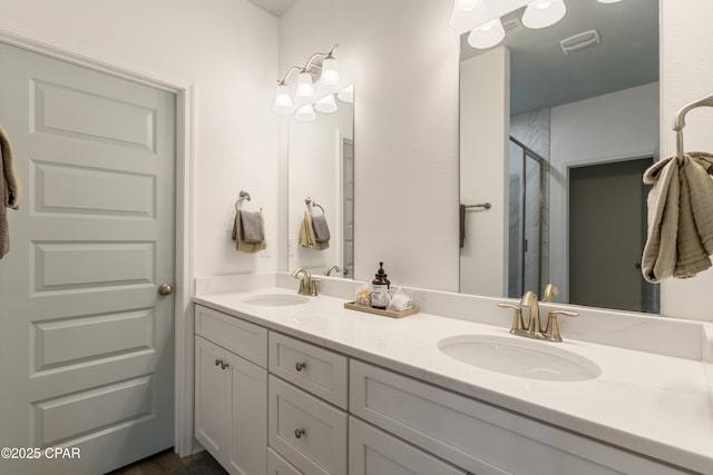 21818 Kelly Pines Pl, Panama City Beach, FL 32413 - bathroom featuring double vanity and a stall shower