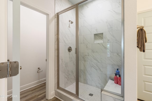21818 Kelly Pines Pl, Panama City Beach, FL 32413 - full bathroom featuring a stall shower and wood finished floors