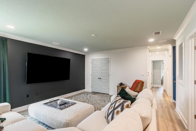 21818 Kelly Pines Pl, Panama City Beach, FL 32413 - living room featuring recessed lighting, light wood-style floors, and ornamental molding