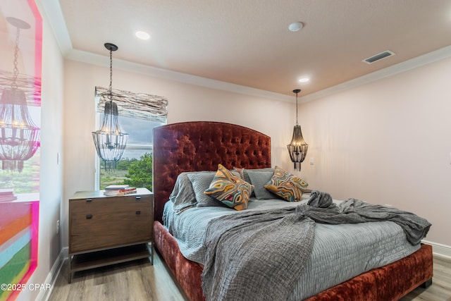 21818 Kelly Pines Pl, Panama City Beach, FL 32413 - bedroom featuring wood finished floors, recessed lighting, and ornamental molding