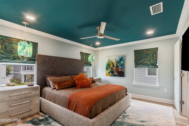 21818 Kelly Pines Pl, Panama City Beach, FL 32413 - bedroom featuring wood finished floors, recessed lighting, a ceiling fan, and ornamental molding