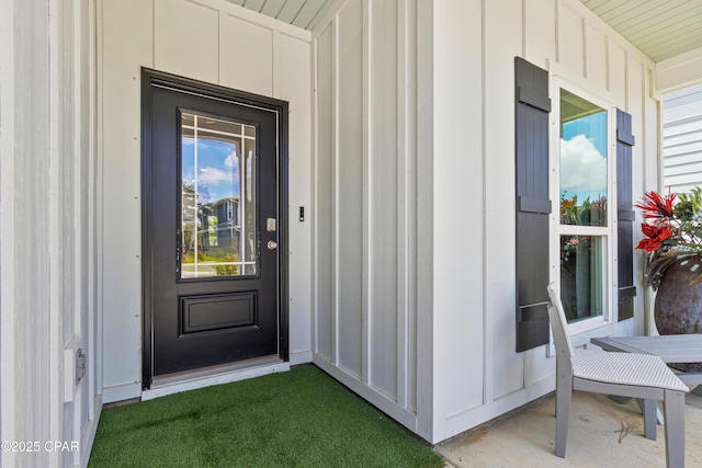 21818 Kelly Pines Pl, Panama City Beach, FL 32413 - doorway to property featuring board and batten siding