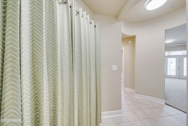 8700 Front Beach Rd Unit 7207, Panama City Beach, FL 32407 - hall featuring light tile patterned flooring and french doors