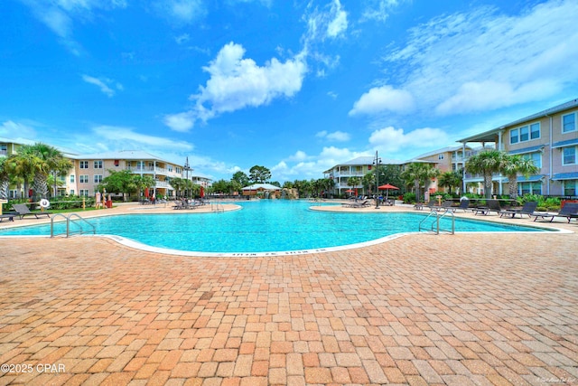 8700 Front Beach Rd Unit 7207, Panama City Beach, FL 32407 - community pool featuring a patio area