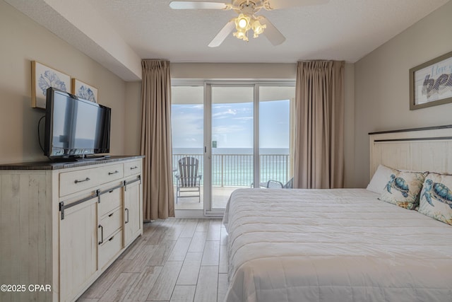 10625 Front Beach Rd Unit 1102, Panama City Beach, FL 32407 - bedroom with access to outside, light wood finished floors, and ceiling fan