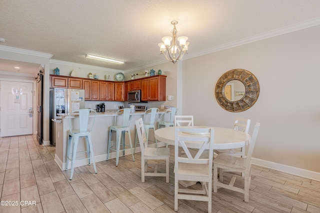 10625 Front Beach Rd Unit 1102, Panama City Beach, FL 32407 - dining area featuring a chandelier, wood tiled floors, and ornamental molding