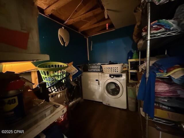 2735 E 12th St, Panama City, FL 32401 - washroom featuring independent washer and dryer and wood finished floors