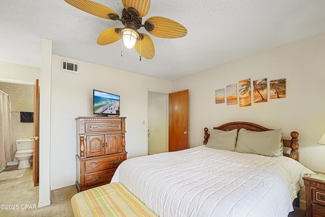 17620 Front Beach Rd Unit 4U, Panama City Beach, FL 32413 - bedroom featuring light colored carpet, a ceiling fan, and connected bathroom