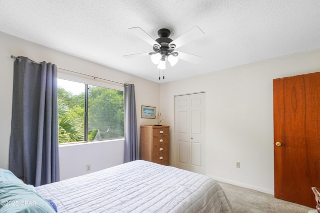 17620 Front Beach Rd Unit 4U, Panama City Beach, FL 32413 - bedroom with carpet flooring, a textured ceiling, ceiling fan, and a closet