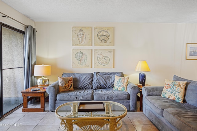 17620 Front Beach Rd Unit 4U, Panama City Beach, FL 32413 - living room with light tile patterned floors and a textured ceiling