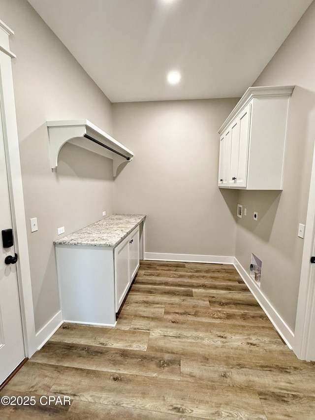 3391 Grey Oak Way, Marianna, FL 32446 - washroom featuring hookup for an electric dryer, cabinet space, hookup for a washing machine, light wood-type flooring, and recessed lighting