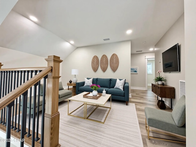 3391 Grey Oak Way, Marianna, FL 32446 - living area featuring light wood-style floors, vaulted ceiling, and recessed lighting