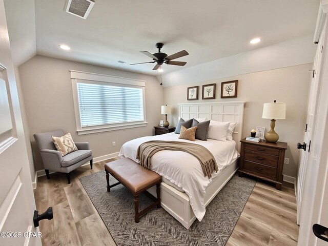3391 Grey Oak Way, Marianna, FL 32446 - bedroom with light wood-style floors, vaulted ceiling, recessed lighting, and ceiling fan