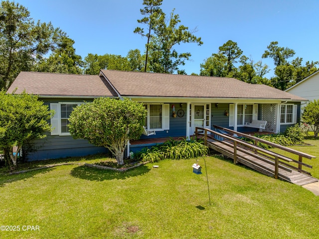1016 Morgan Ave, Chattahoochee, FL 32324 - single story home with a porch, a front lawn, and roof with shingles