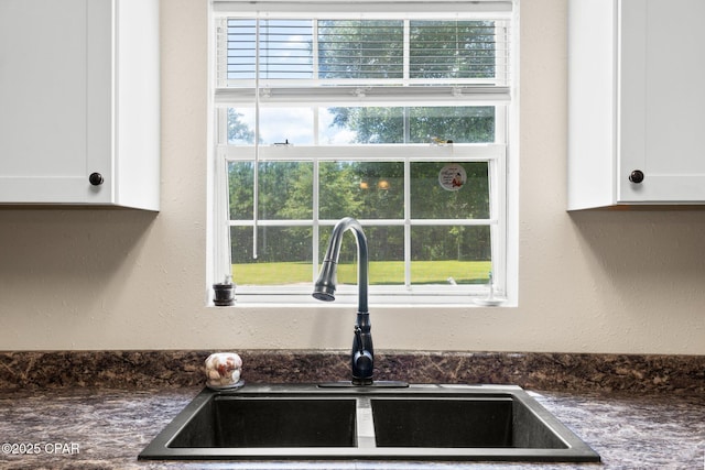 3483 Kynesville Rd, Marianna, FL 32448 - kitchen view of dark countertops and white cabinets