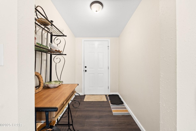 3483 Kynesville Rd, Marianna, FL 32448 - entryway with dark wood finished floors and baseboards