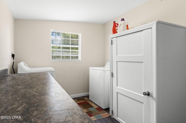 3483 Kynesville Rd, Marianna, FL 32448 - washroom featuring washer and dryer and dark wood-style floors