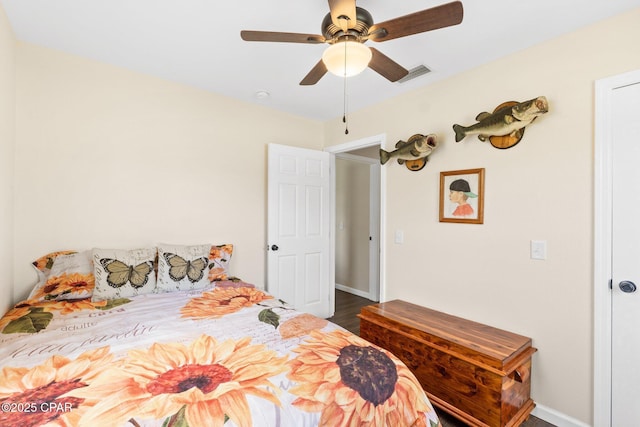 3483 Kynesville Rd, Marianna, FL 32448 - bedroom with dark wood finished floors and a ceiling fan