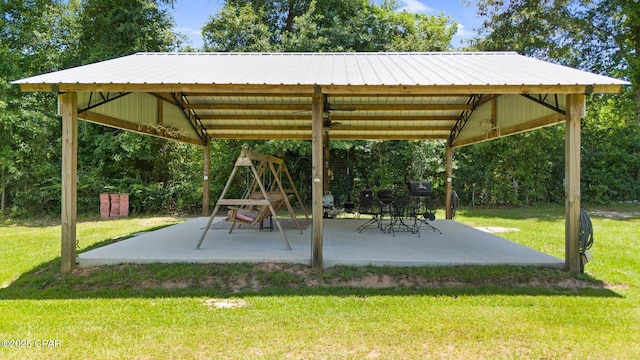 3483 Kynesville Rd, Marianna, FL 32448 - surrounding community featuring a lawn, a patio, and a gazebo