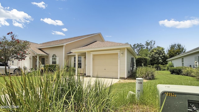 3023 Meadow St, Lynn Haven, FL 32444 - view of front facade with an attached garage, a front yard, and roof with shingles