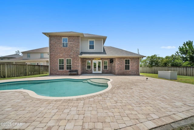 3033 Osprey Cir, Panama City, FL 32405 - view of pool featuring a patio area, french doors, and a fenced backyard