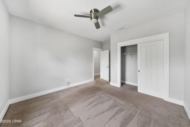3033 Osprey Cir, Panama City, FL 32405 - unfurnished bedroom with carpet, a closet, and ceiling fan