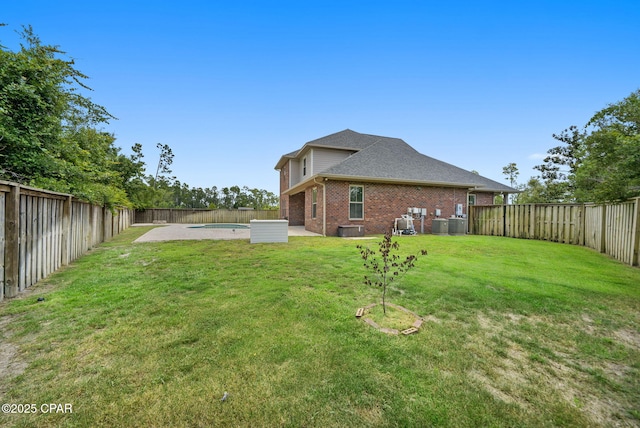 3033 Osprey Cir, Panama City, FL 32405 - fenced backyard with a patio