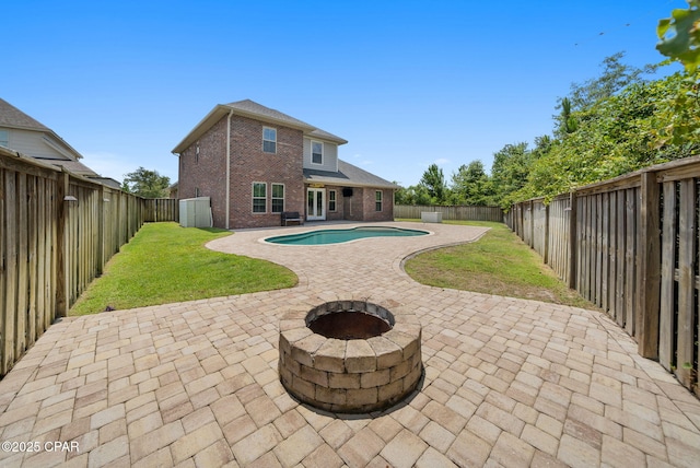 3033 Osprey Cir, Panama City, FL 32405 - view of pool with a patio area, an outdoor fire pit, and a fenced backyard