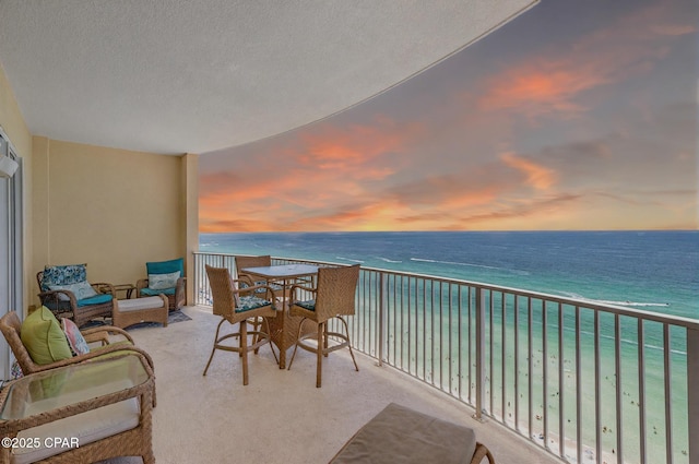 10625 Front Beach Rd Unit 1902, Panama City Beach, FL 32407 - balcony at dusk featuring view of water and beach