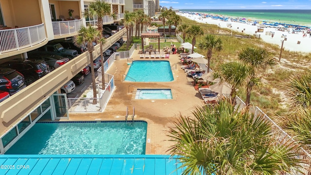 10625 Front Beach Rd Unit 1902, Panama City Beach, FL 32407 - community pool featuring view of water and beach and a patio area